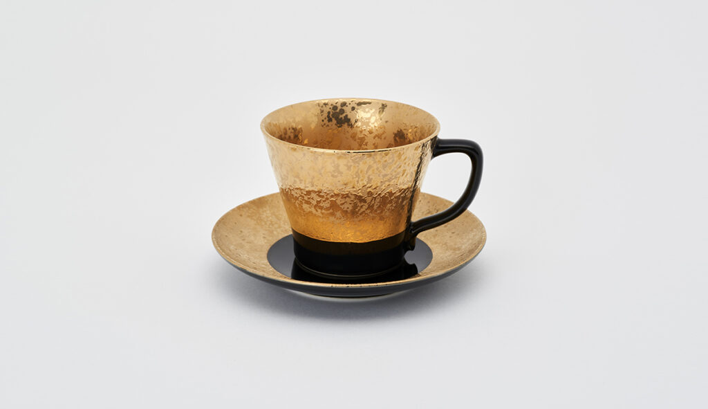 Gold and Black Coffee Cup and Saucer